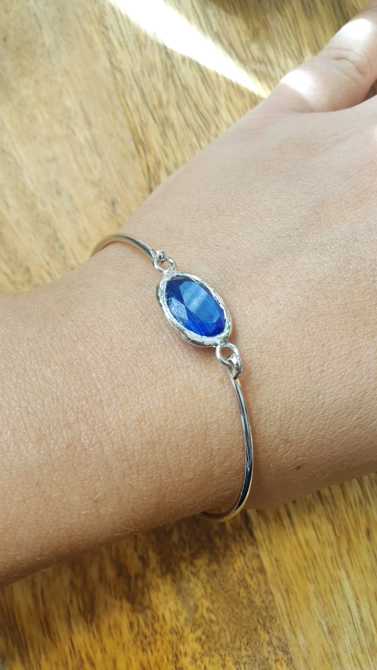 Bracciali di ottone argentato con occhio di gatto